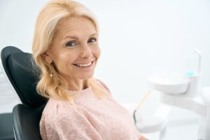 woman sitting in a dental chair